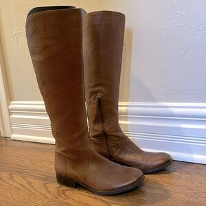 Jessica Simpson knew-high boots